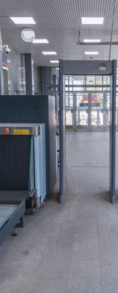 Security checkpoint in the railway station corridor.